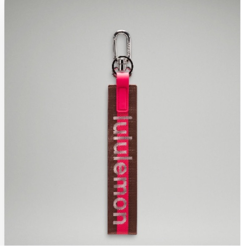 NWT Lululemon Never Lost Red and Brown Keychain